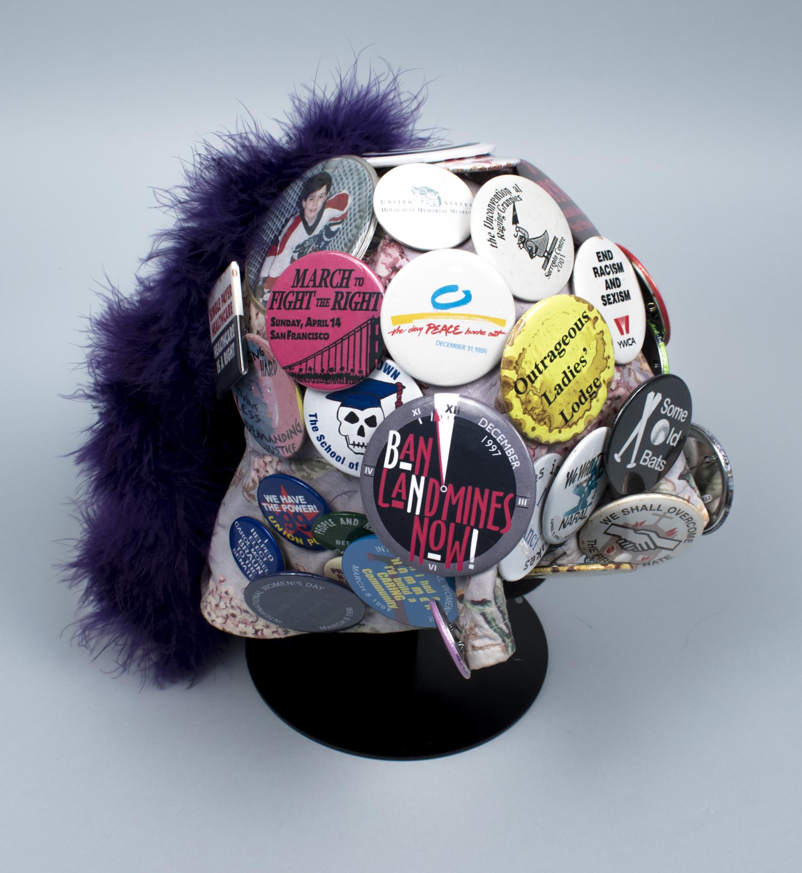 Image of Seattle Raging Grannies hat with activist buttons, ca. 1995