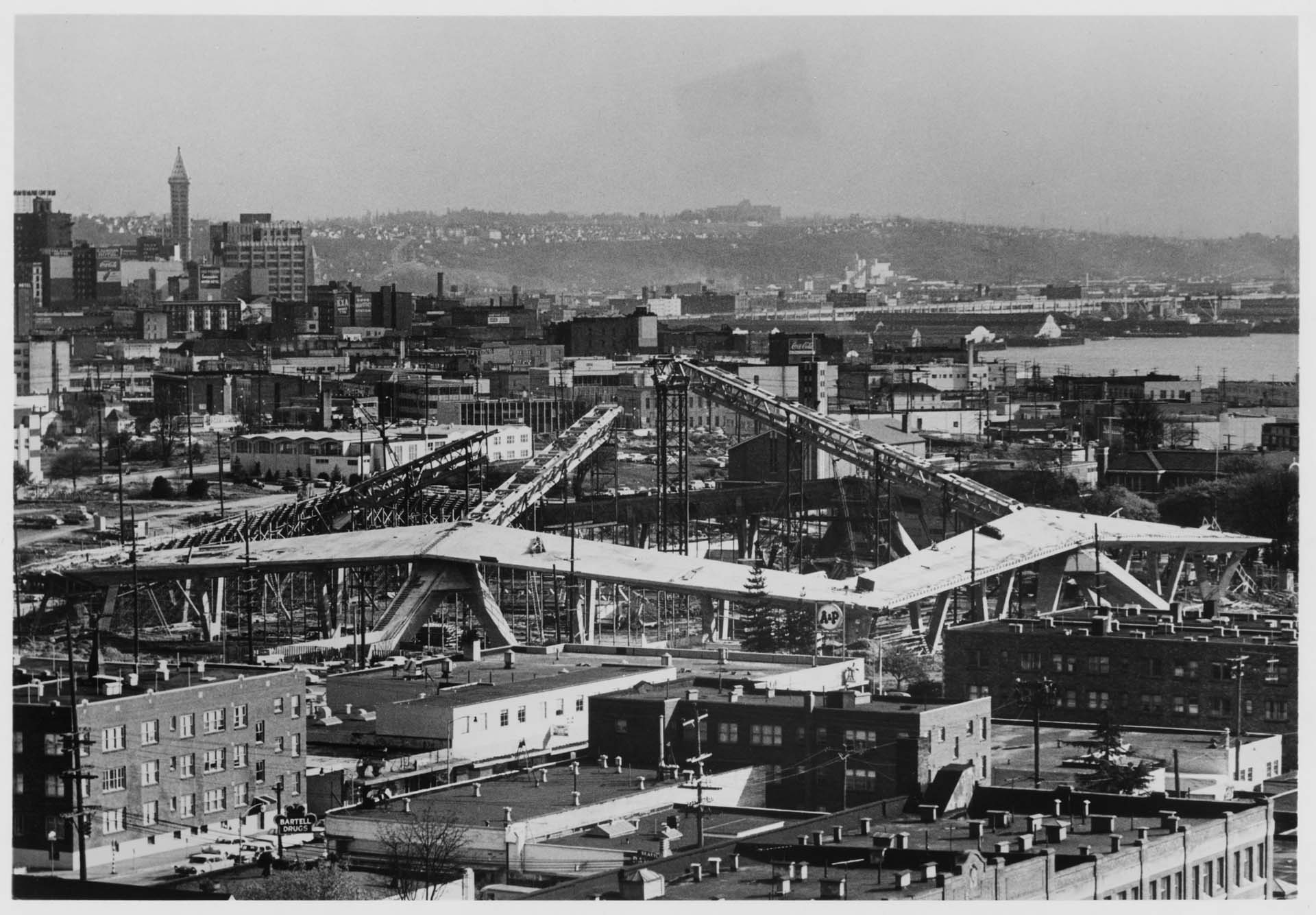 Image of Century 21 Exposition fairgrounds, with view of Washington State Coliseum construction site, Seattle, 1961