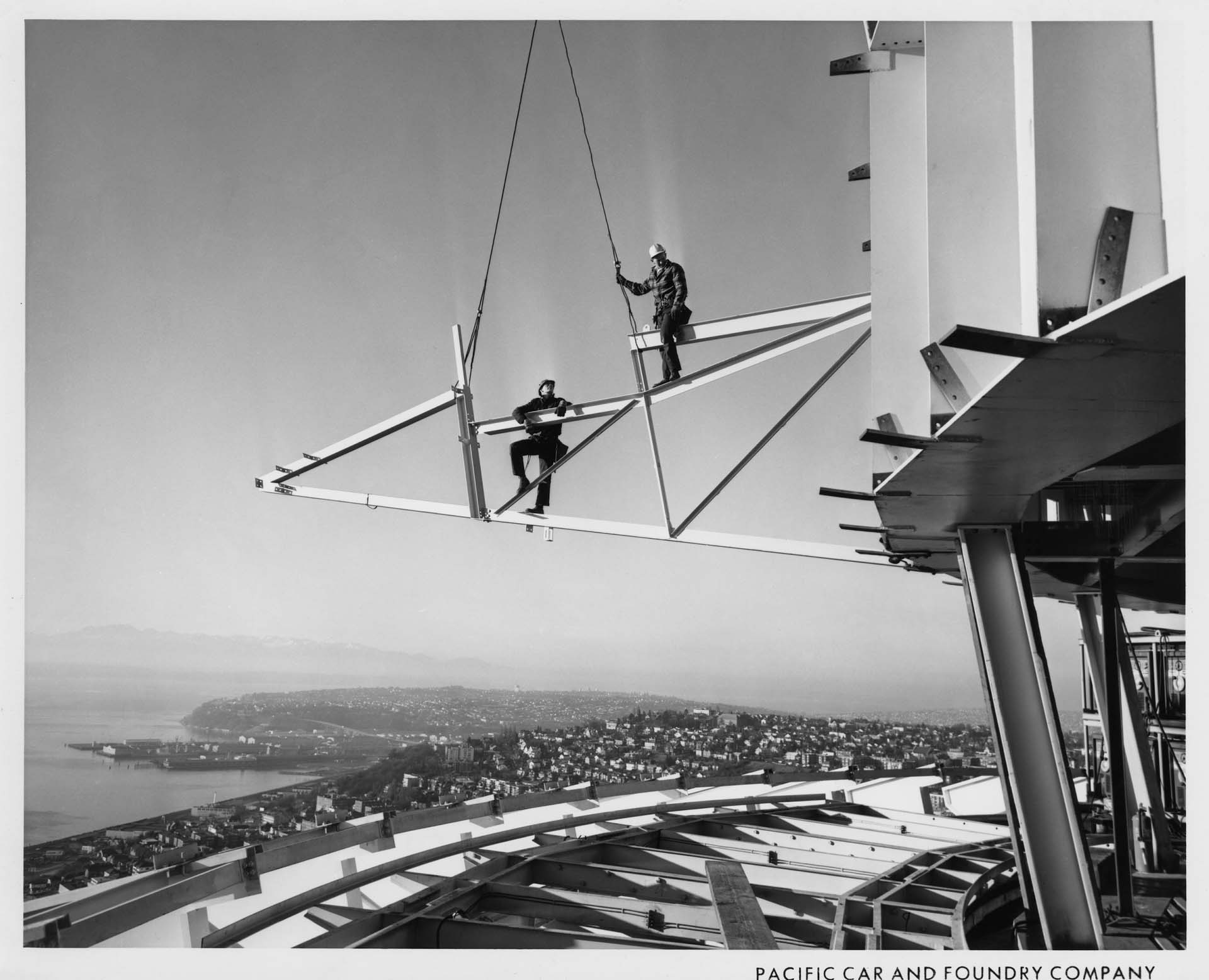 Image of Steelworkers during construction of observation deck level of Space Needle, 1961