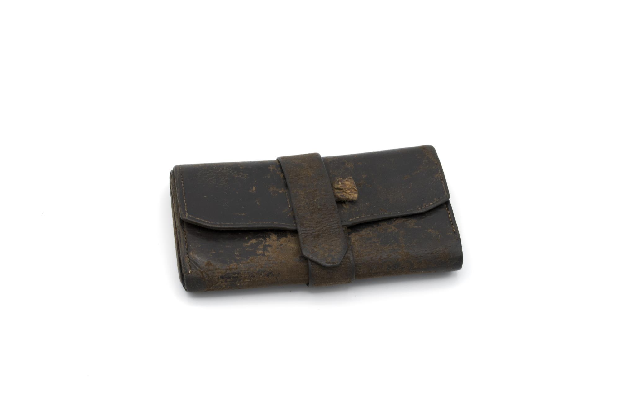 Image of Robert Moran's wallet from when he first arrived in Seattle, ca. 1875