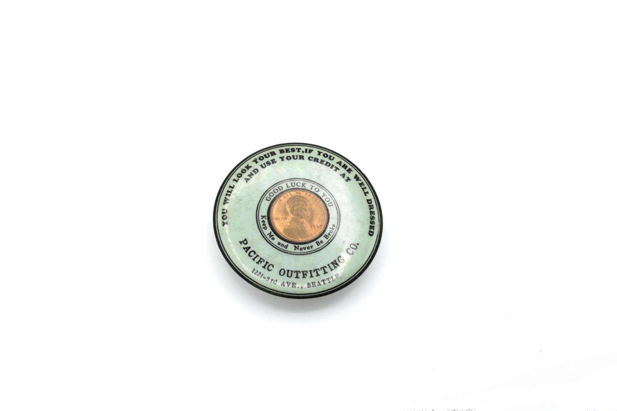 Image of Pocket mirror advertising Pacific Outfitting Co., ca. 1930s