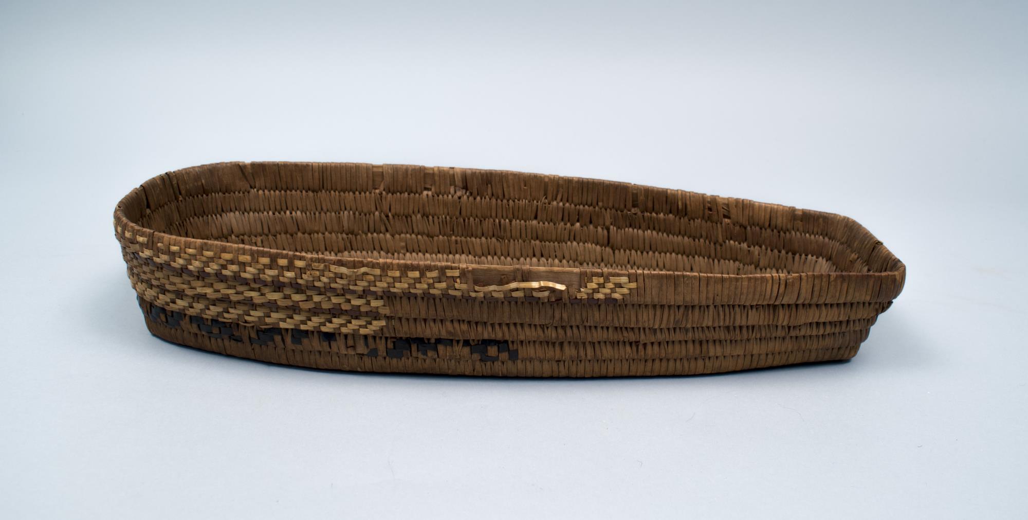 Image of Salish cradle basket made from cedar root and cedar slats, probably Interior Salish, ca. 1900-1930