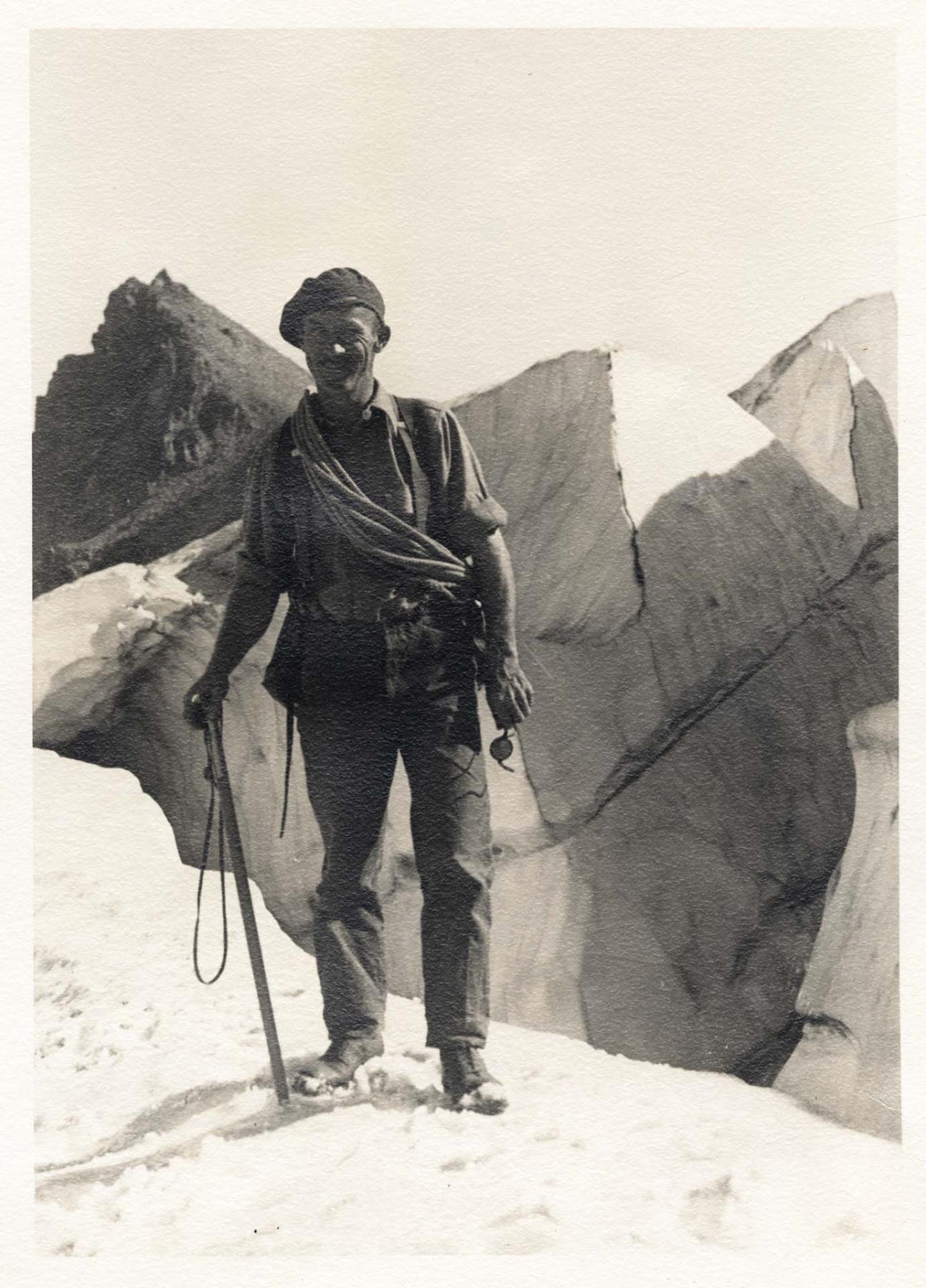 Image of Park Ranger Charles Browne with ice axe near crevasse, Mount Rainier National Park,  circa 1930