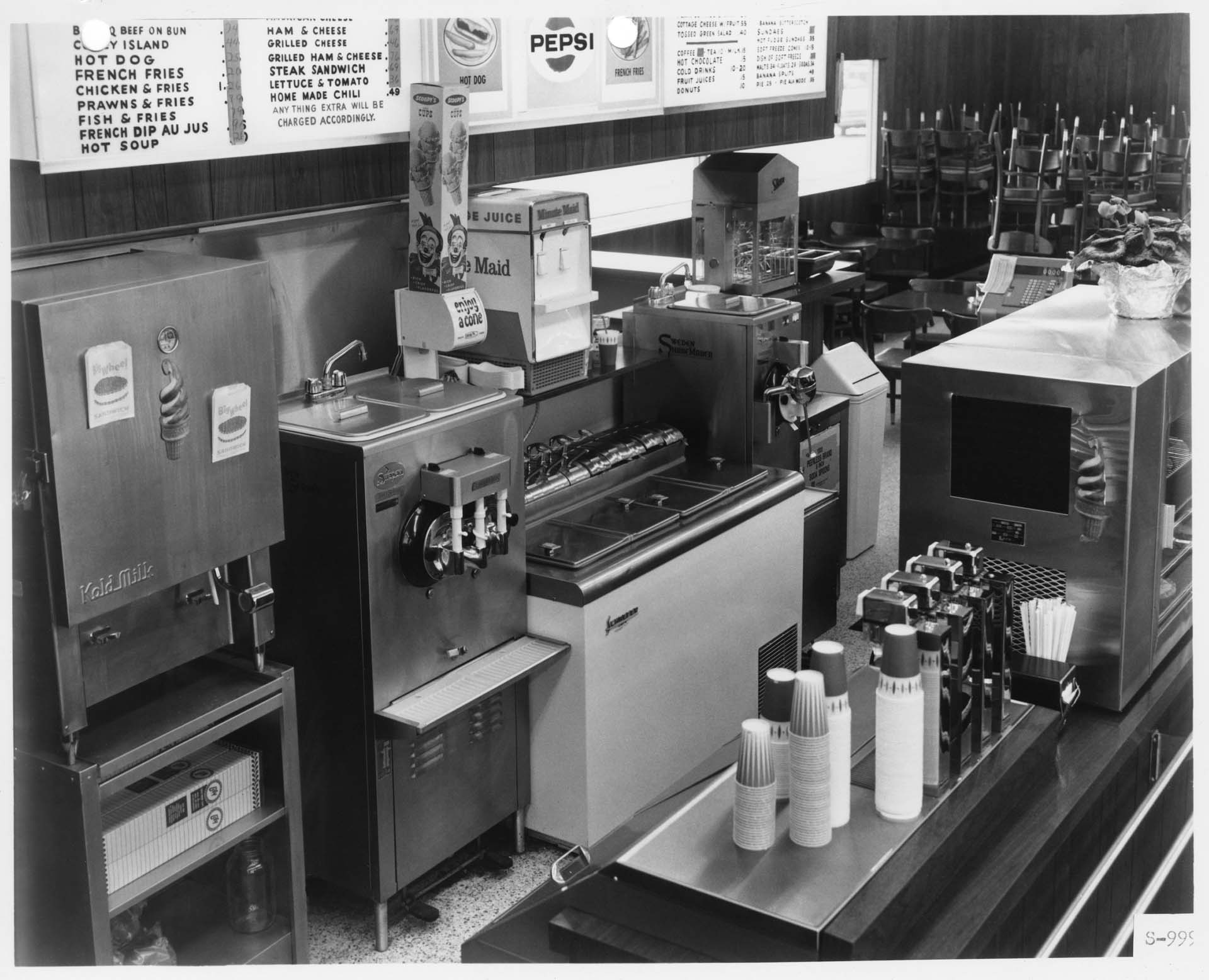 Image of Sweden Freezer Manufacturing Company ice cream and shake machines in diner, circa 1970