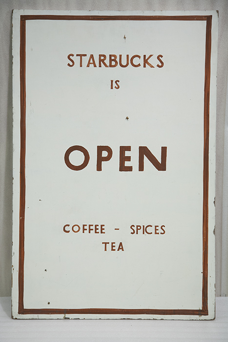 Image of Original sidewalk sign from first Starbucks shop once located at 2000 Western Avenue in Seattle, 1971