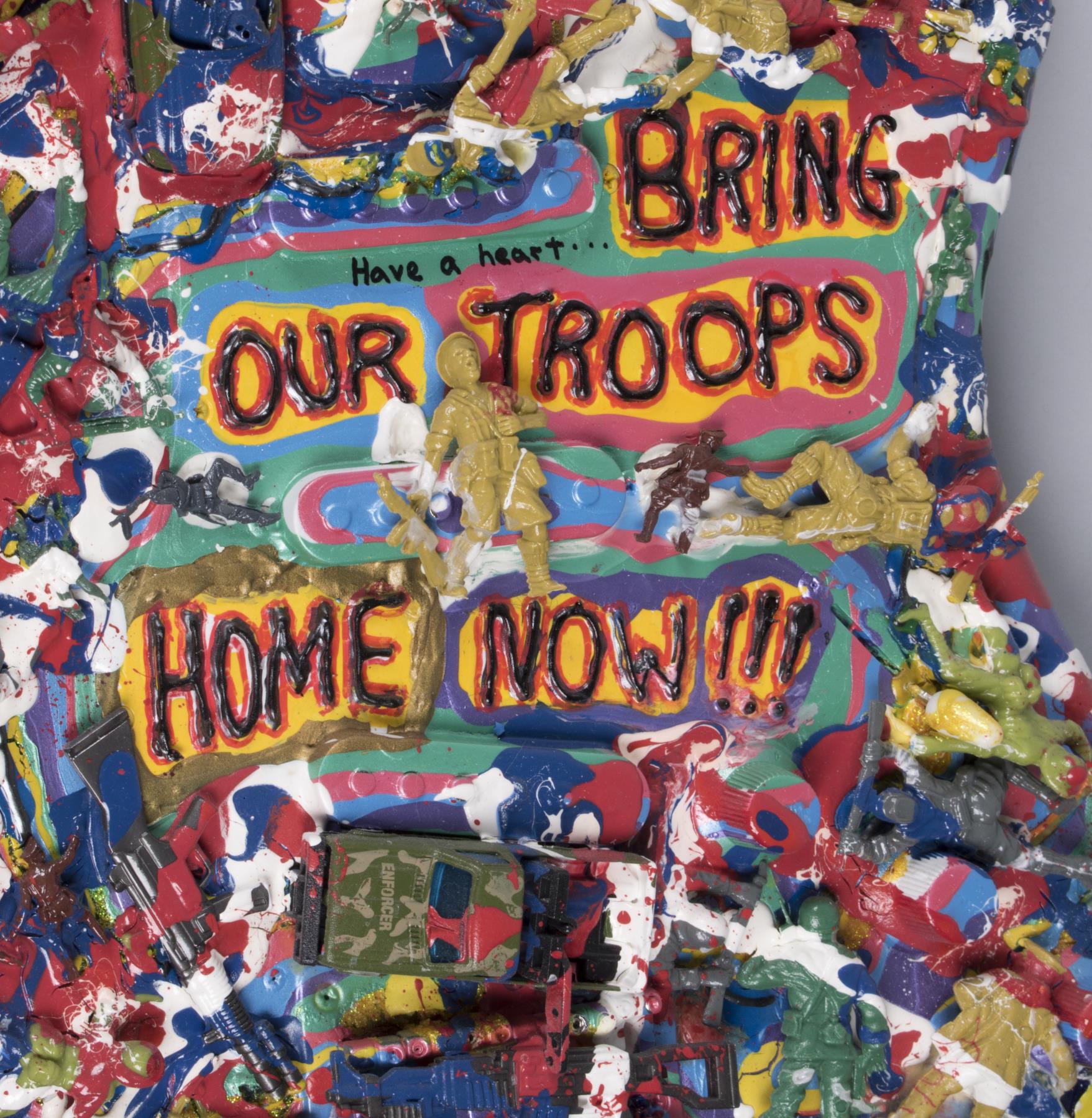 Image of War protest art assemblage, guitar covered with paint and army toys, 2004