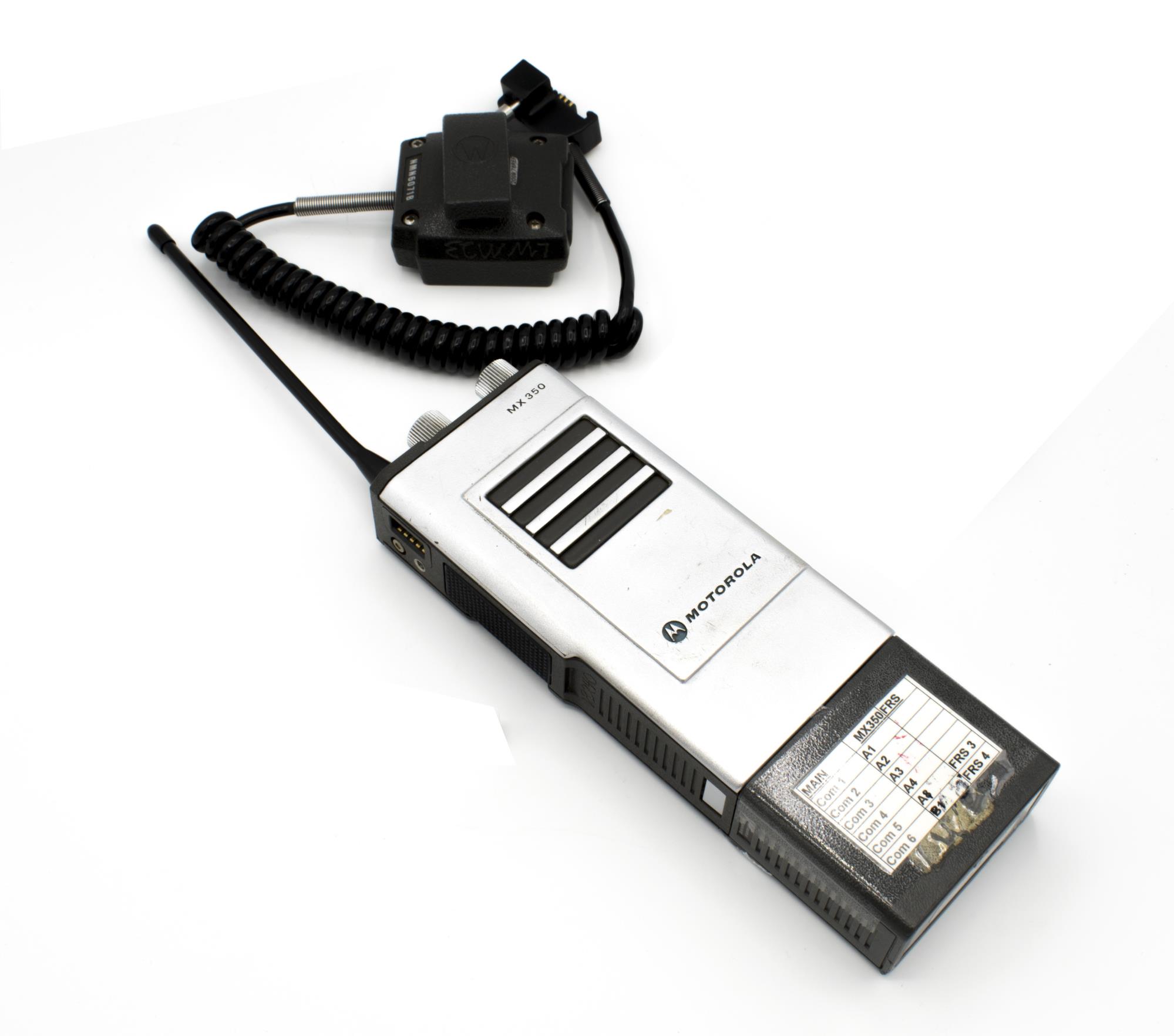 Image of One of two Motorola handheld radios, used by Direct Action Network during the WTO protests, 1999