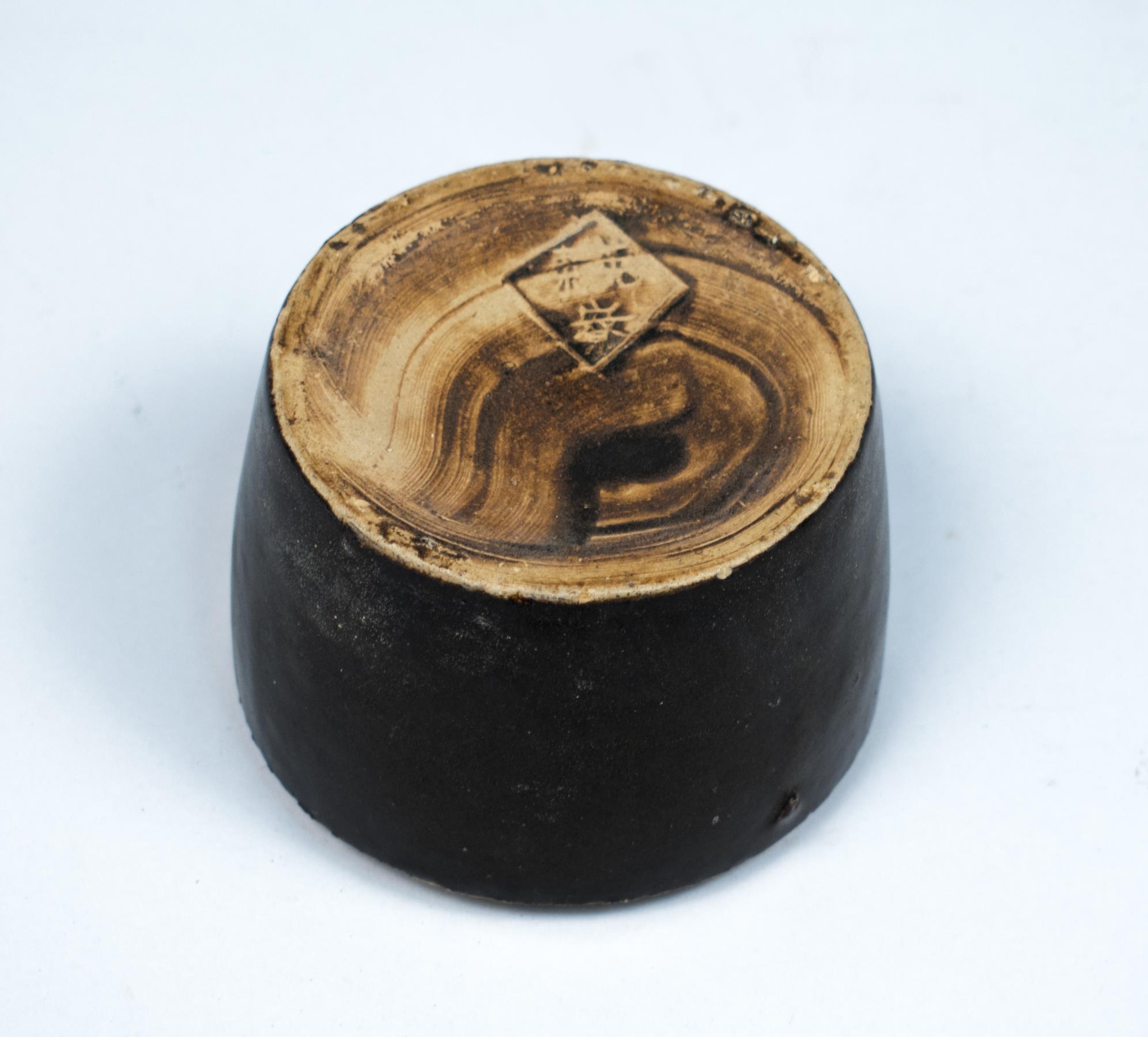 Image of Ceramic cookpot, used at Hong Lee Laundry, ca. 1930s