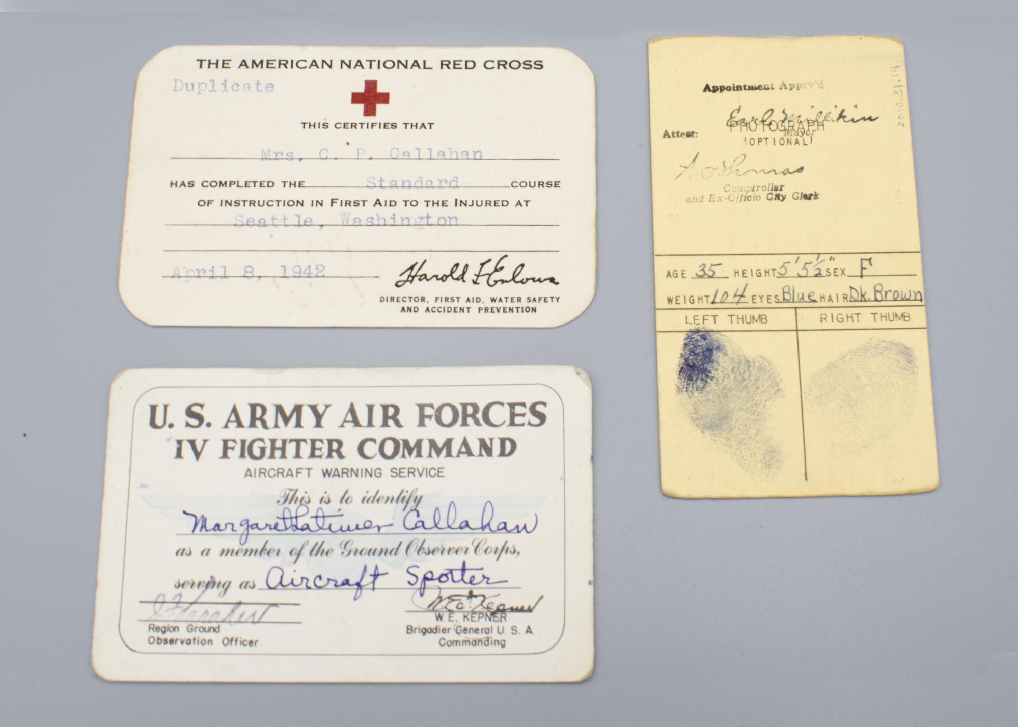 Image of US Army Air Forces and Red Cross identification cards for Margaret Latimer Callahan, 1942