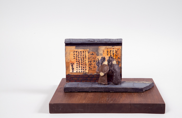 Image of Sculpted ceramic scene depicting Paul Horiuchi's wall in Chinatown by Lorene Spencer, 1970