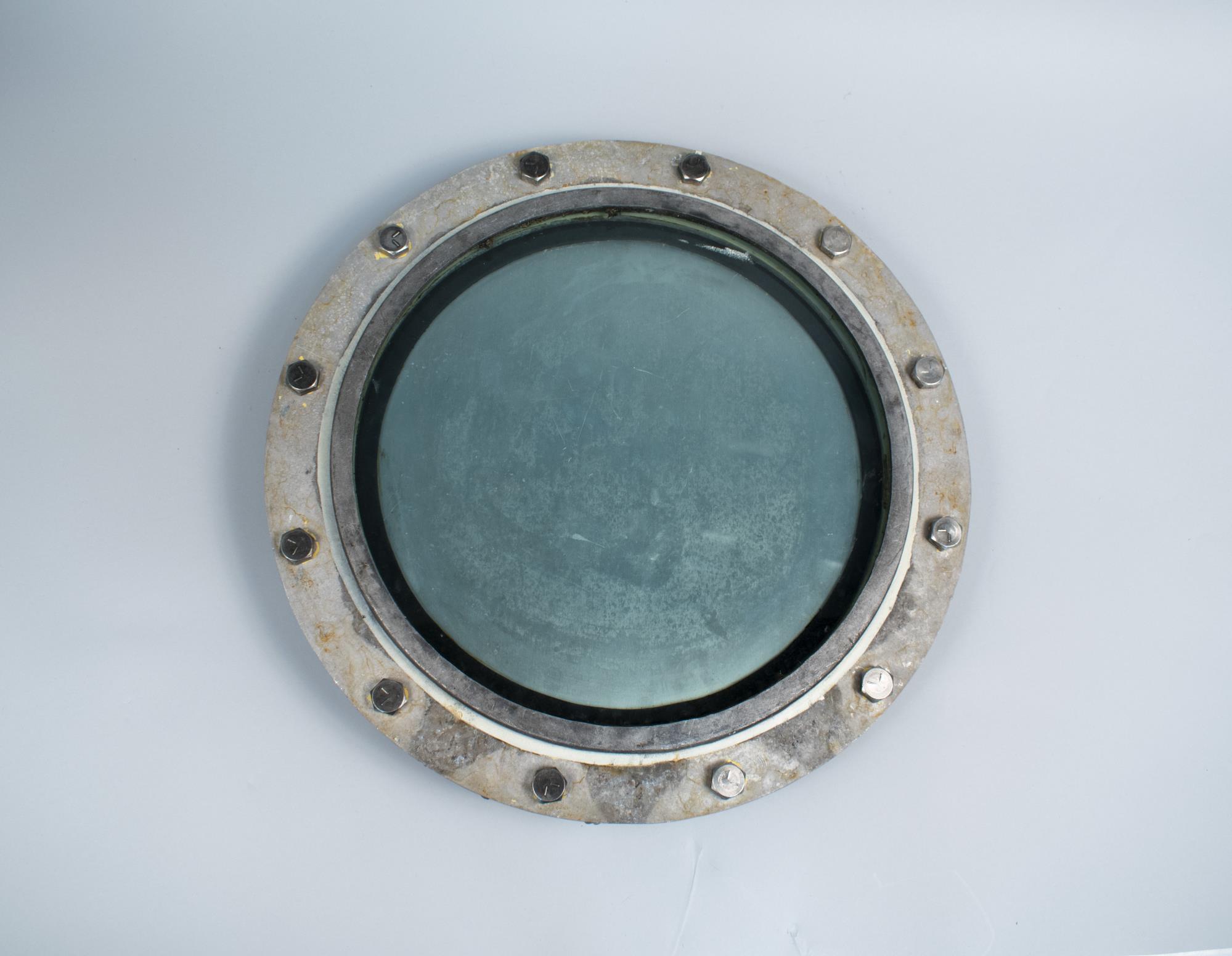 Image of Porthole from the tank room in the Naval Reserve Center Armory building at South Lake Union, ca. 1941