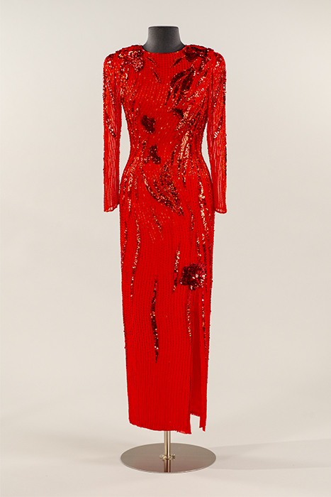 Image of Red crepe chiffon dress worn by Congresswoman Jennifer Dunn to a White House Christmas Party, ca. 1992-2004