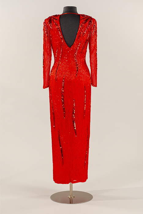 Image of Red crepe chiffon dress worn by Congresswoman Jennifer Dunn to a White House Christmas Party, ca. 1992-2004