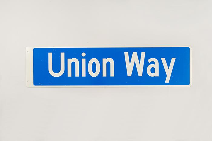 Image of Street sign for Union Way, temporarily posted on Pine Street during the World Trade Center (WTO) conference in Seattle, 1999