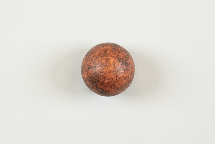 Image of Orange plastic street hockey ball used for bike polo in Seattle, ca. 2005