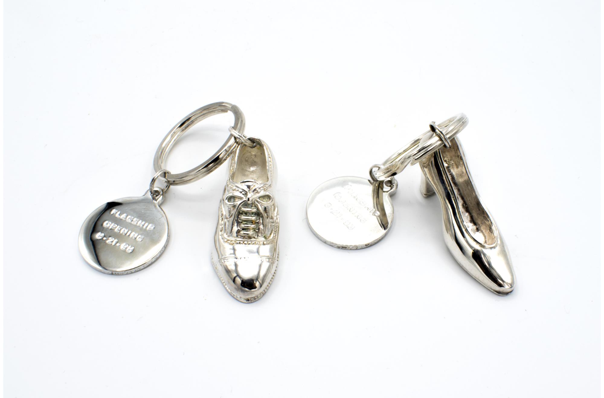Image of Silver key ring with shoe charm, 1998