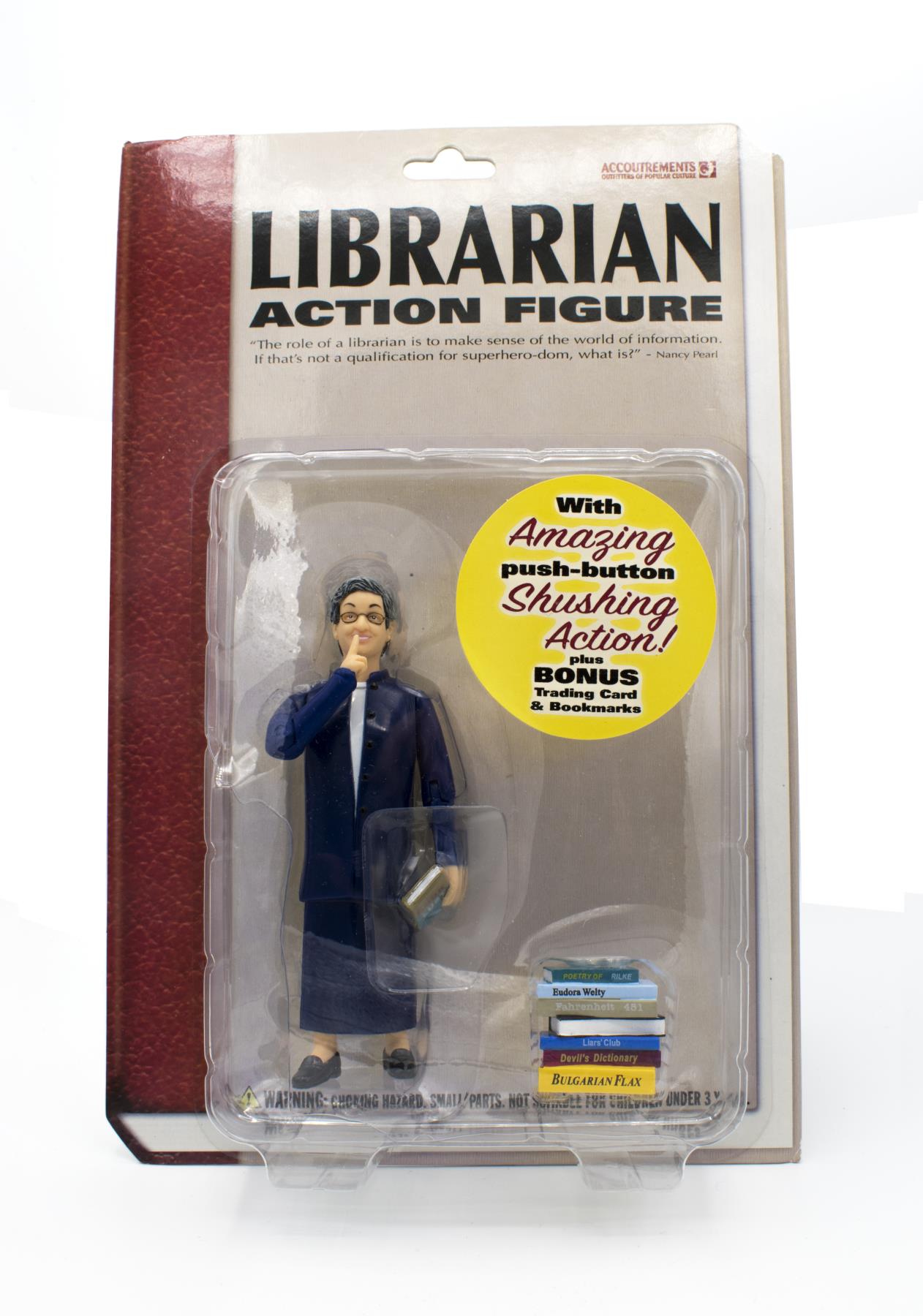 Image of Librarian action figure inspired by Seattle librarian, Nancy Pearl, from the Seattle retail store Archie McPhee's, 2003