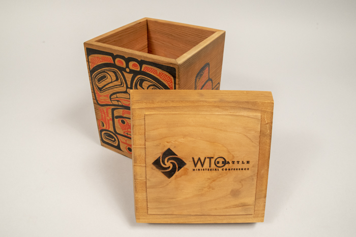 Image of Bentwood style cedar box given as a gift to Seattle World Trade Organization (WTO) conference attendees, 1999