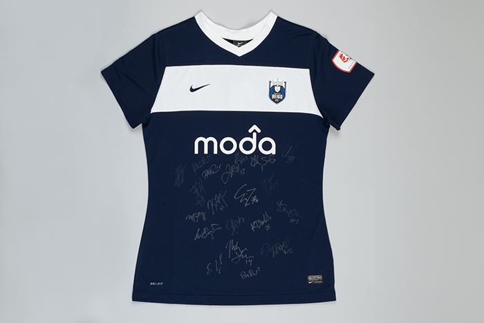 Image of Seattle Reign FC soccer jersey autographed by players, 2013