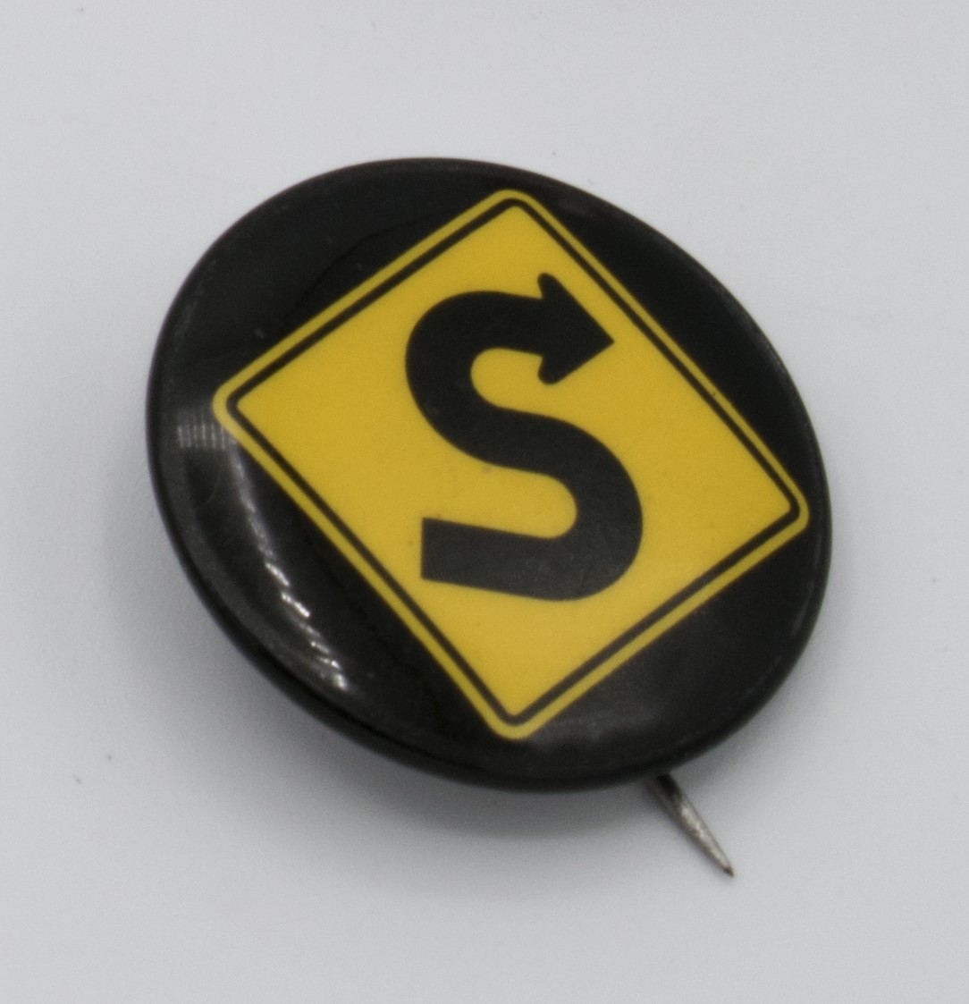 Image of Northwest AIDS Foundation pin to promote and encourage safe sex, ca. 1990