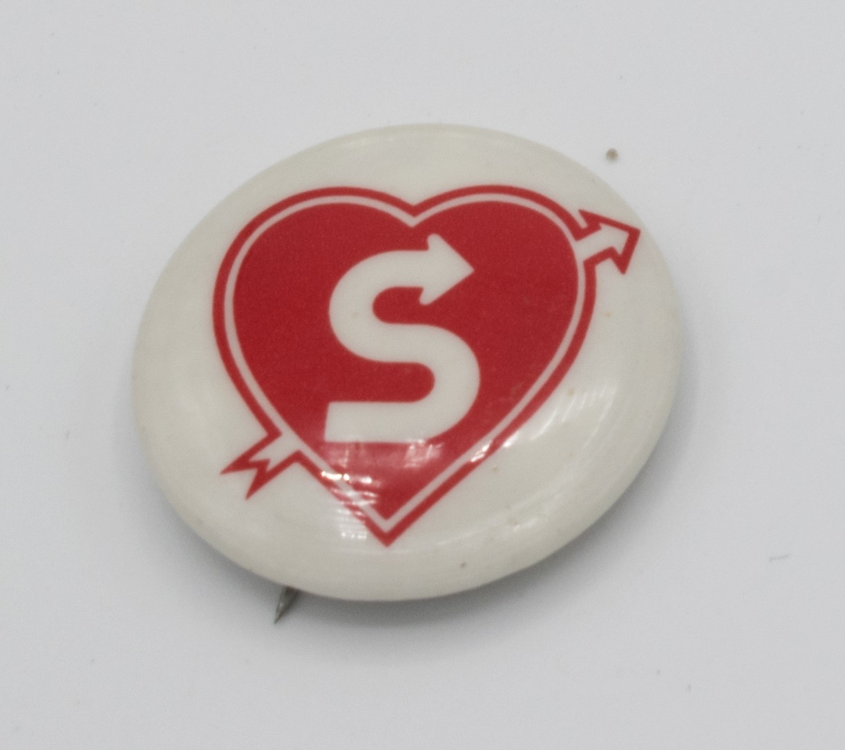 Image of Northwest AIDS Foundation pin to promote and encourage safe sex, ca. 1990