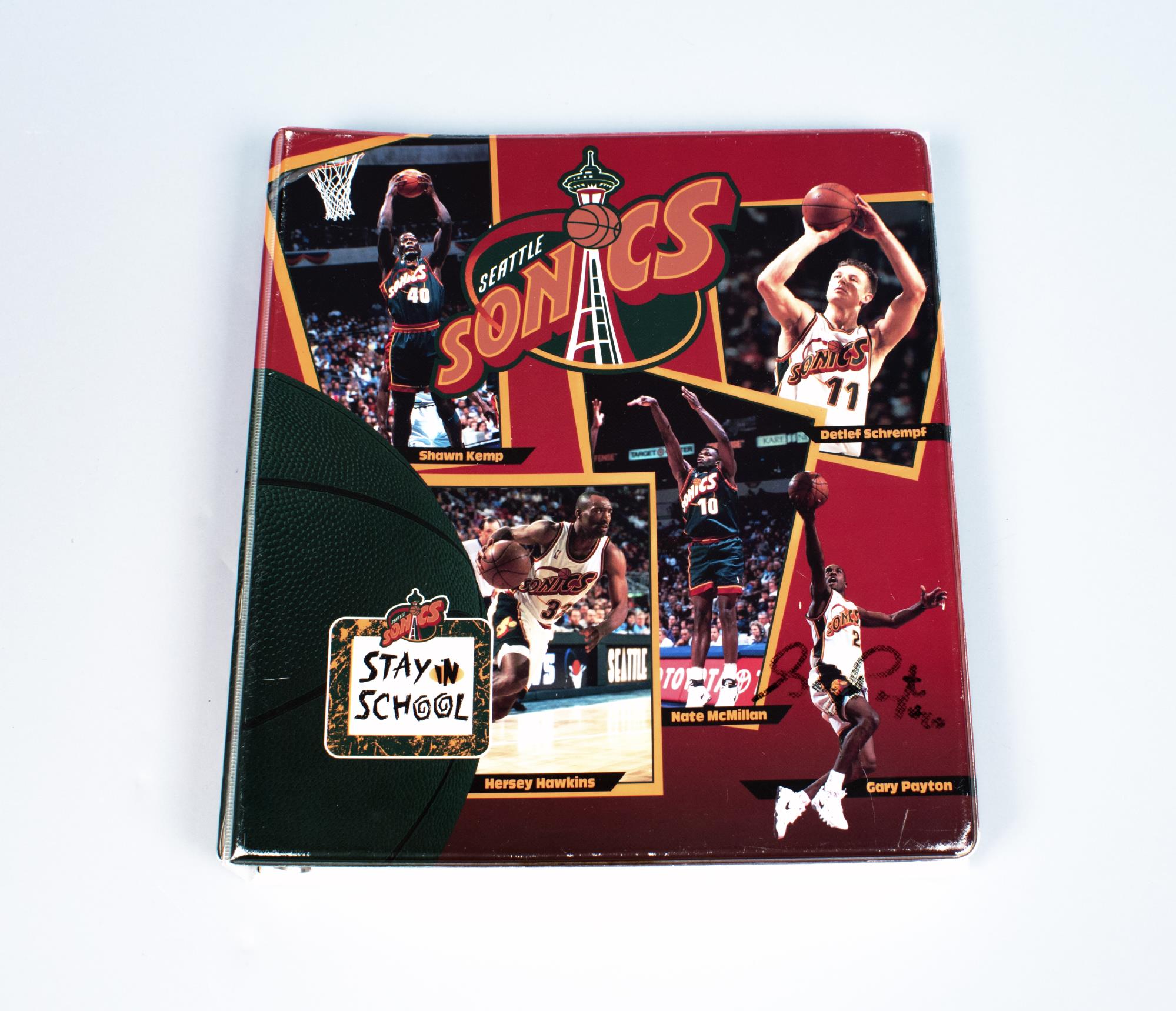 Image of Seattle SuperSonics binder with autographs by Gary Payton and Ervin Johnson, 1996