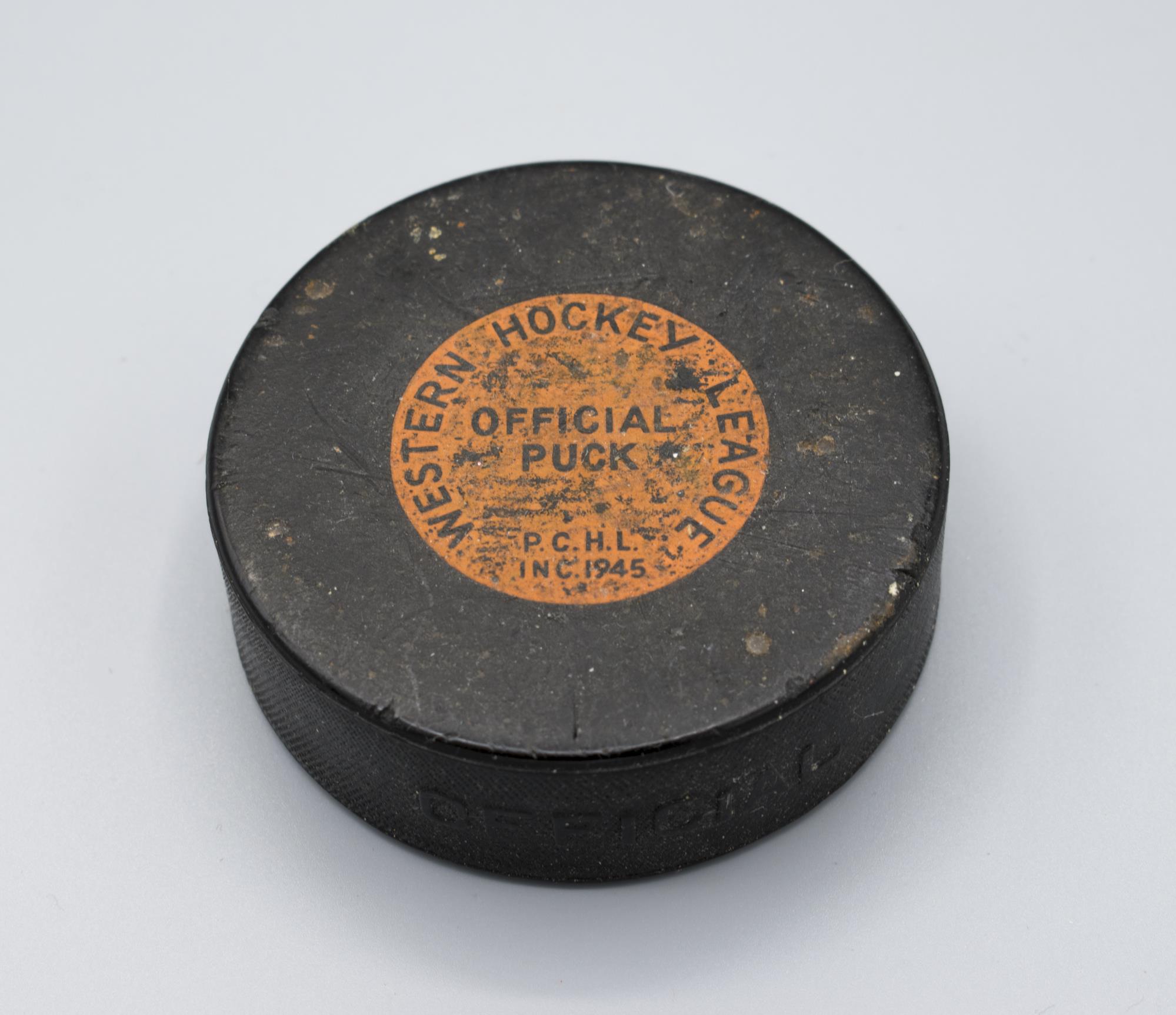 Image of Seattle Totems hockey puck, ca. 1960s
