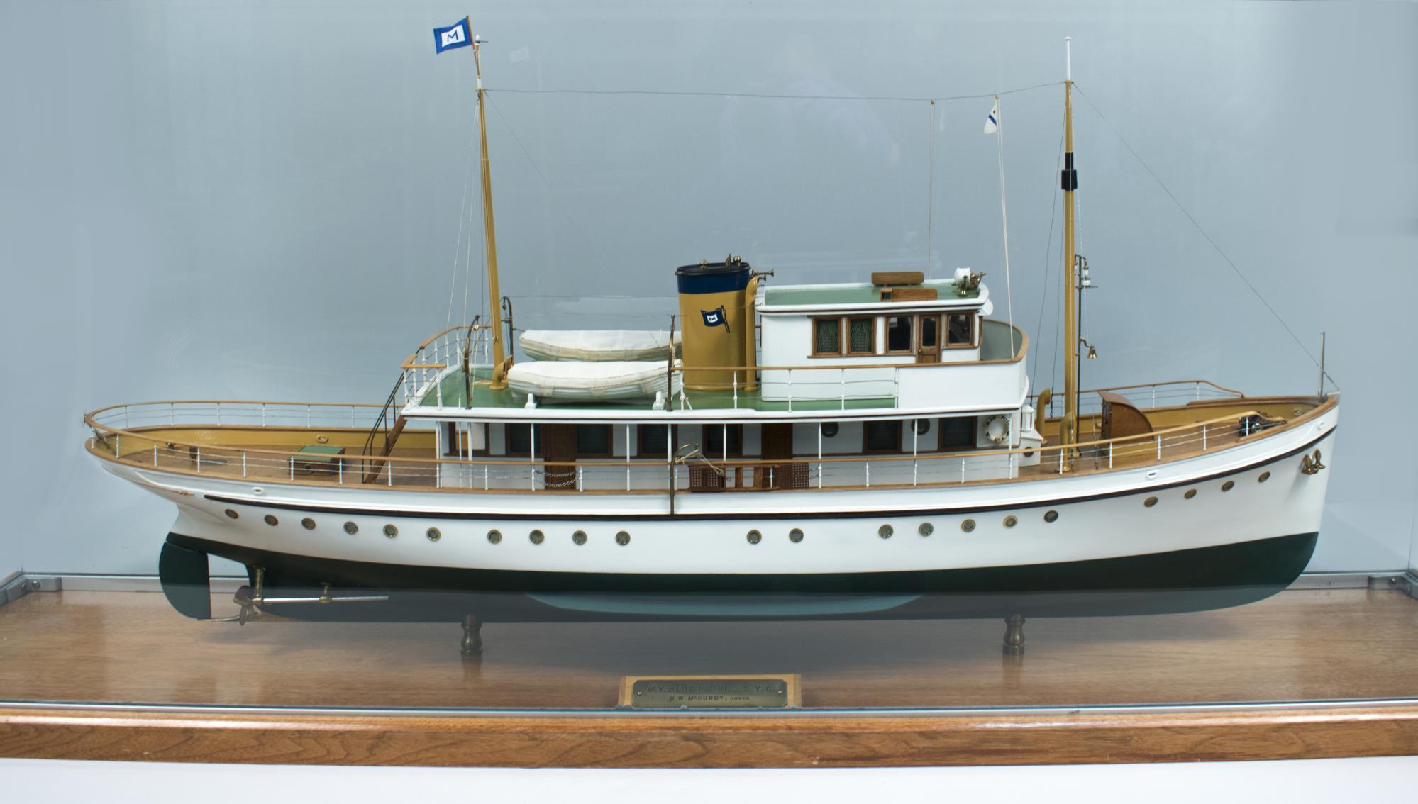 Image of Ship model of the M.Y. BLUE PETER in glass case, ca. 1950