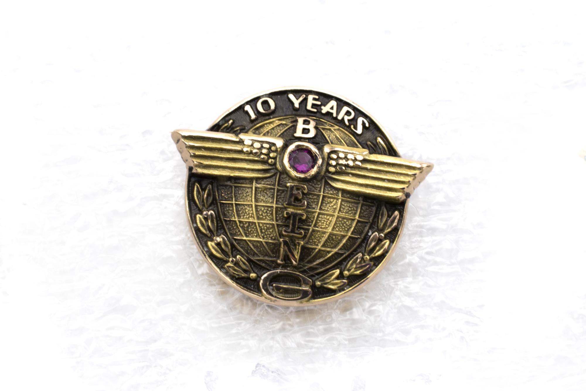 Image of Boeing employee service pin, 10 years, presented to Kito Kaneta, ca. 1960s