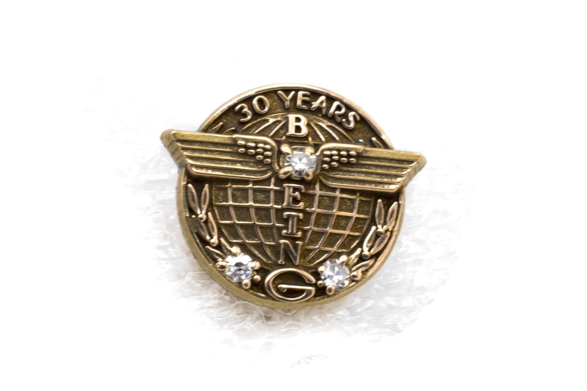 Image of Boeing employee service pin, 30 years, presented to Kito Kaneta, ca. 1980s