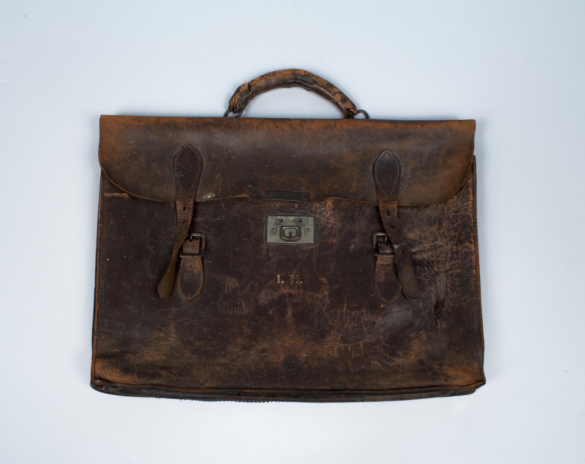 Image of Leather satchel owned by Ivar Haglund while attending the University of Washington, ca. 1920s