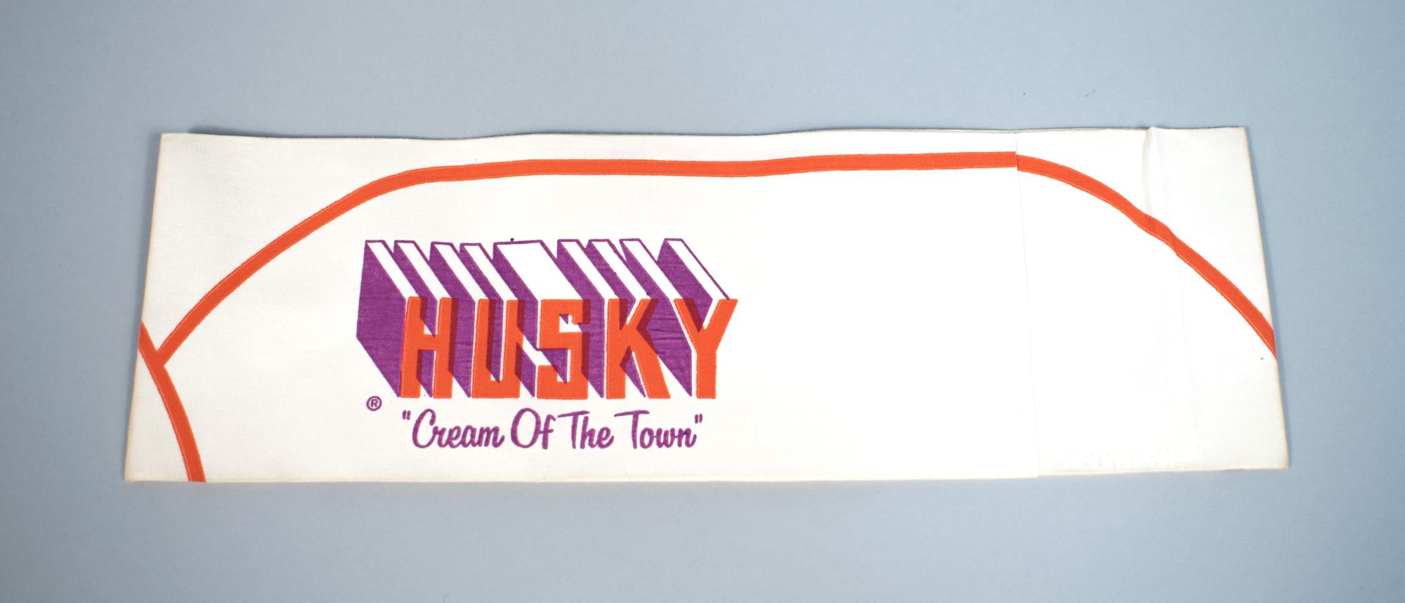 Image of Husky Deli employee paper hat, ca. 1960s