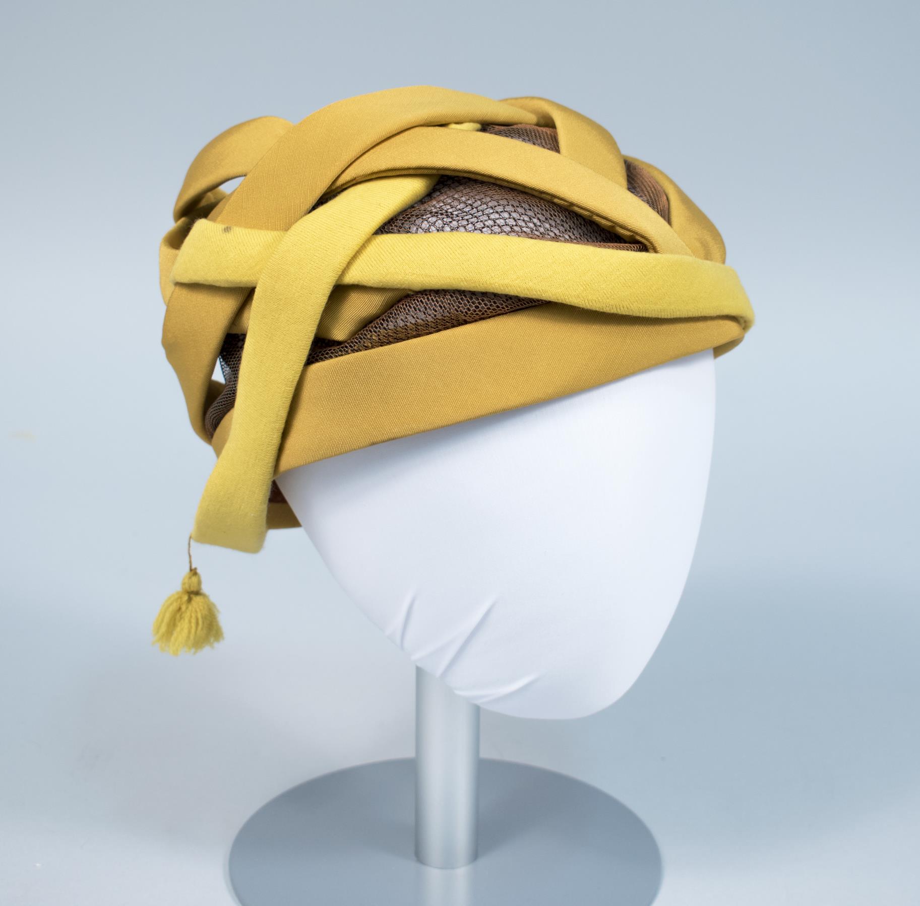 Image of Mustard yellow hat, made by John Eaton, 1960s