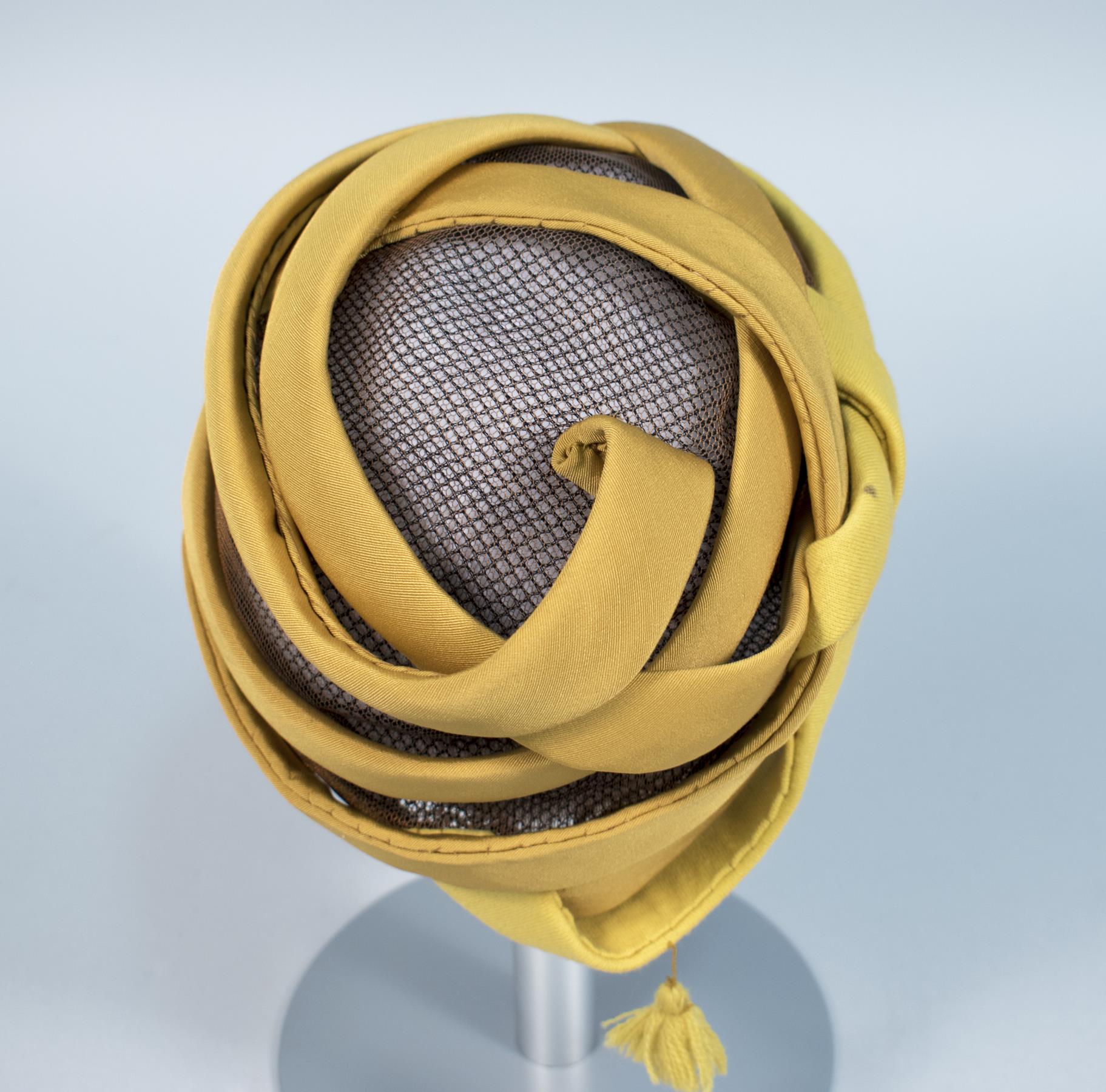 Image of Mustard yellow hat, made by John Eaton, 1960s