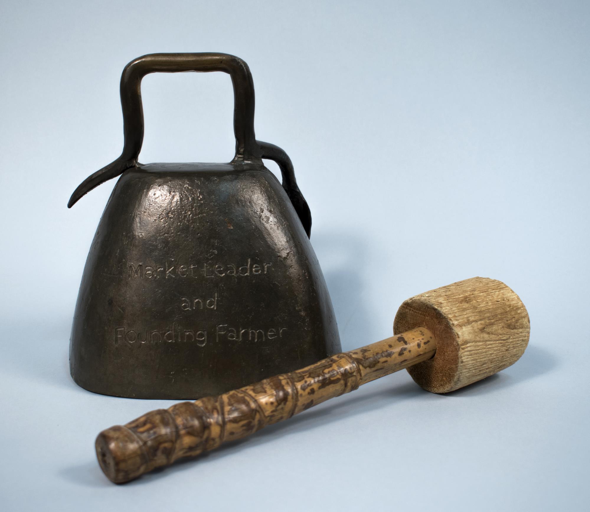 Image of Brass bell and mallet made in honor of Bob Meyer, a leader in the Puget Sound farmers markets community, 1938-2002