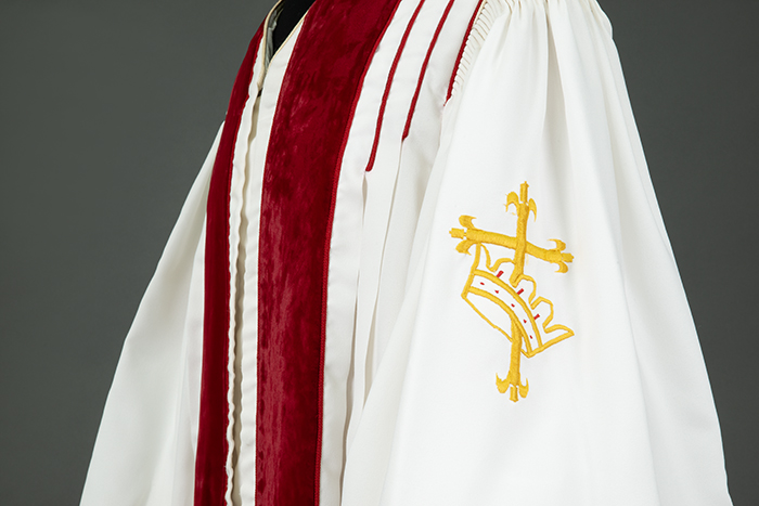 Image of White and red church robe, worn by Reverend Dr. Samuel B. McKinney, ca. 1980s