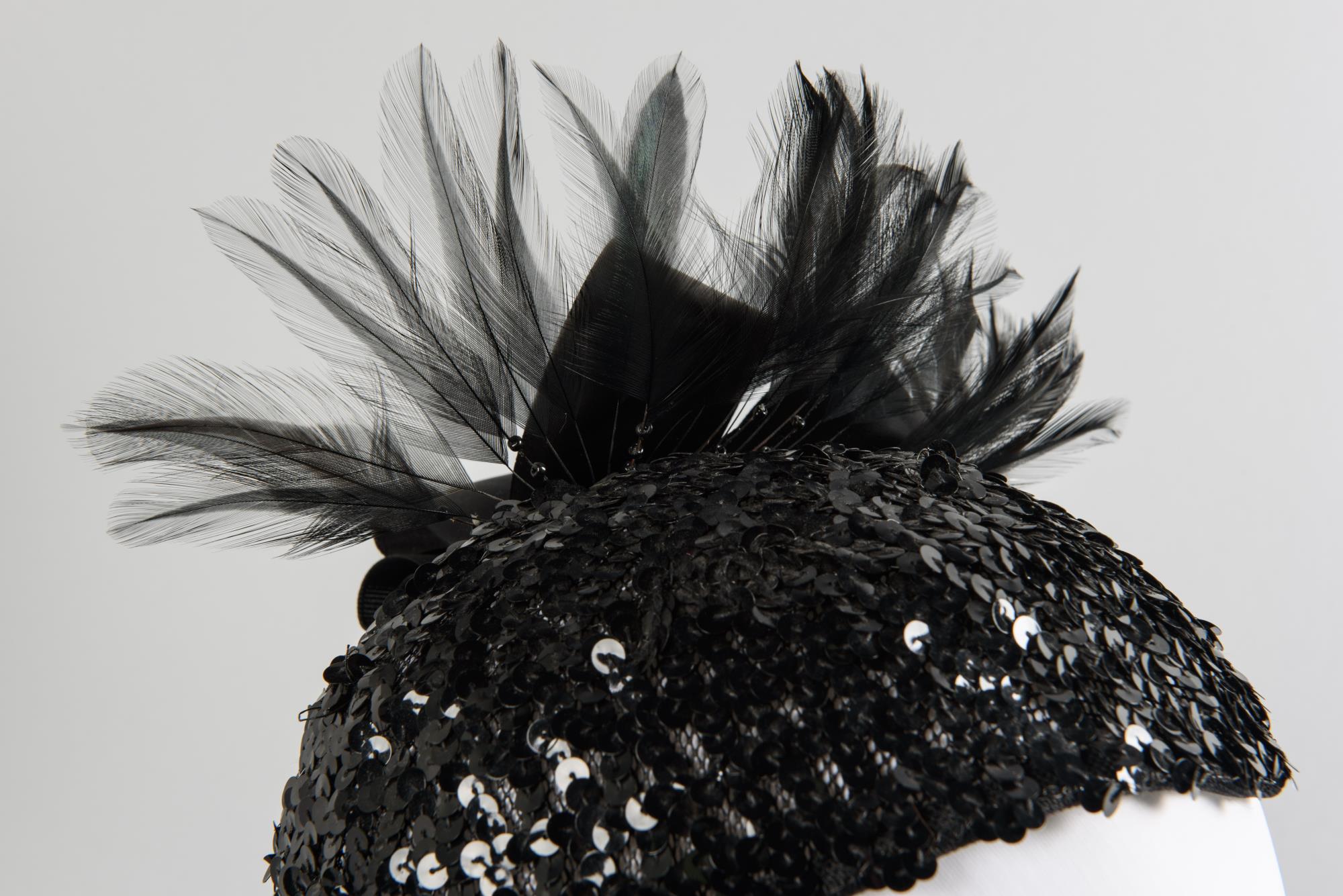 Image of Black hat with sequins and feathers designed by Ethel Young, ca. 1950s-1960s