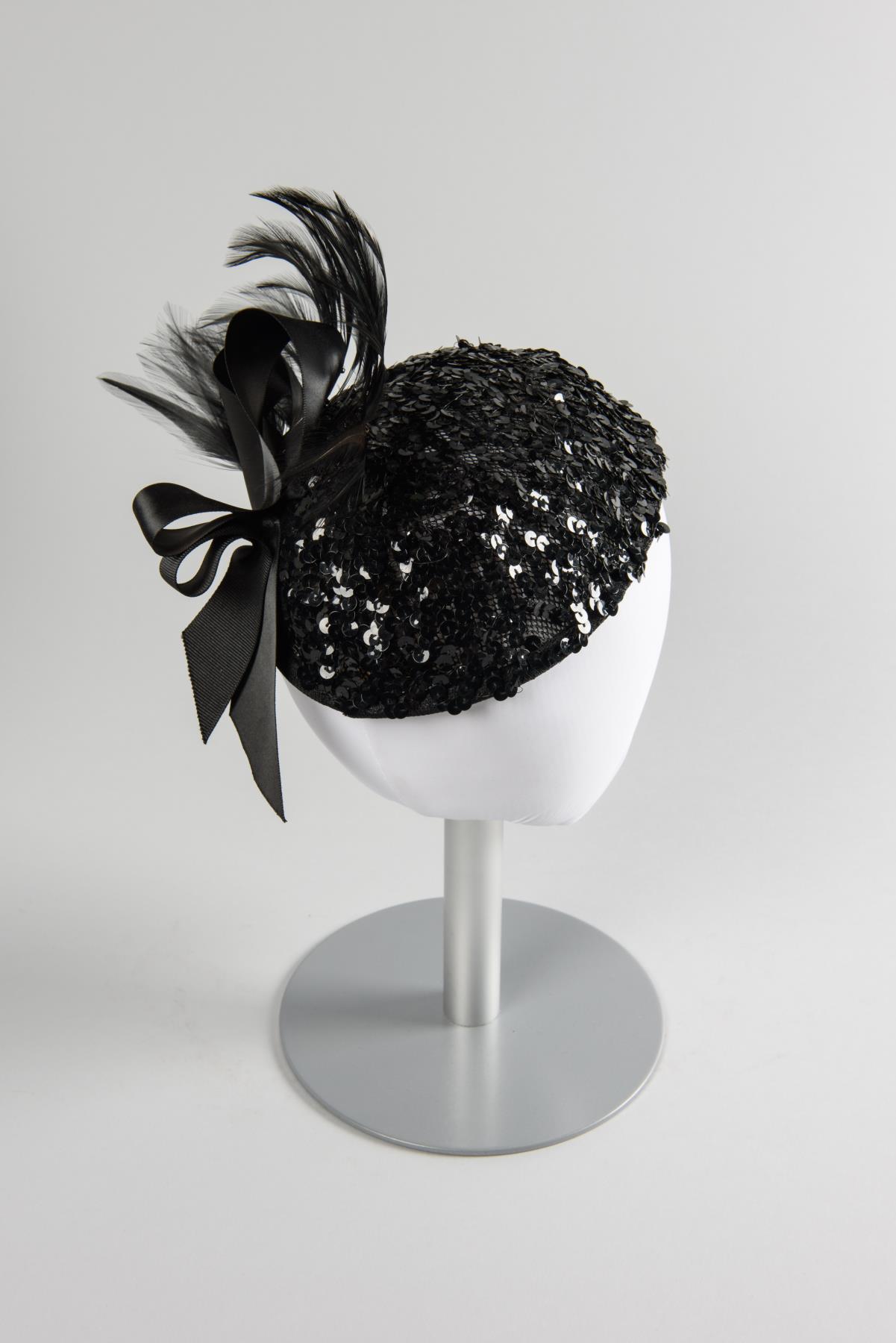 Image of Black hat with sequins and feathers designed by Ethel Young, ca. 1950s-1960s
