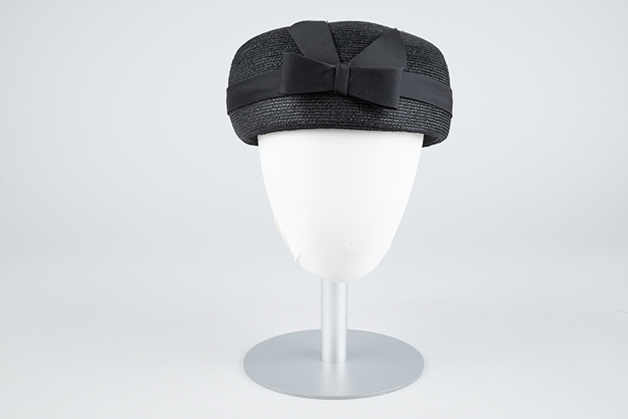 Image of Black straw pillbox hat designed by Ethel Young, ca. 1950s-1960s