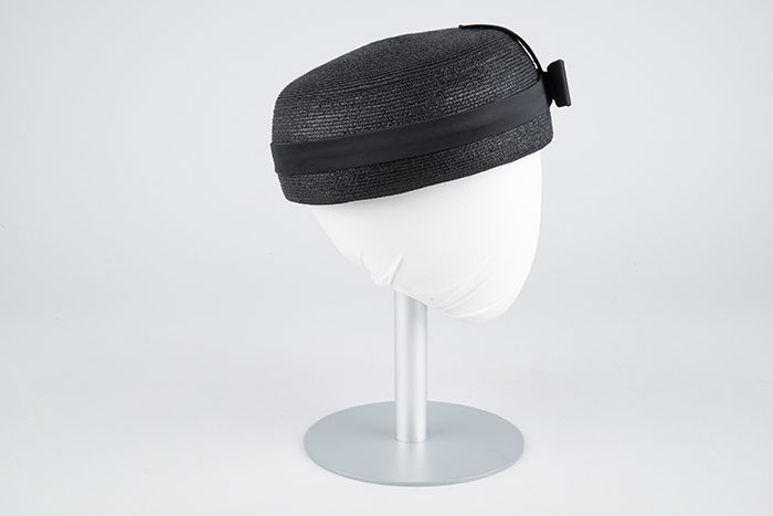 Image of Black straw pillbox hat designed by Ethel Young, ca. 1950s-1960s