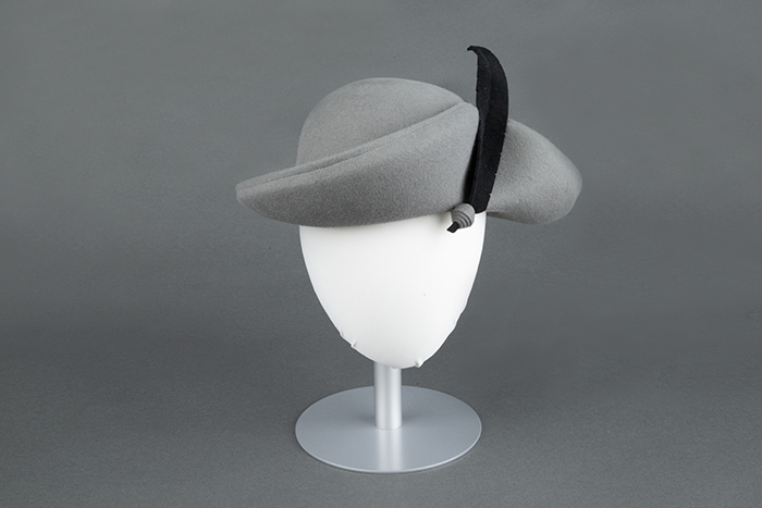 Image of Gray felt hat with felt feather, made by Wayne Wichern, ca. 1990s-2000s