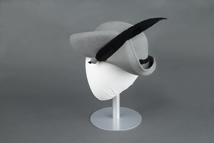 Image of Gray felt hat with felt feather, made by Wayne Wichern, ca. 1990s-2000s