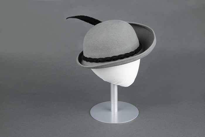 Image of Gray felt hat with felt feather, made by Wayne Wichern, ca. 1990s-2000s