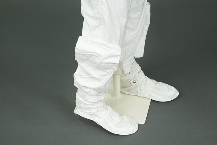 Image of Inflight coverall jacket, pants, and boots owned by astronaut Richard Francis Gordon, Jr., 1970-1971
