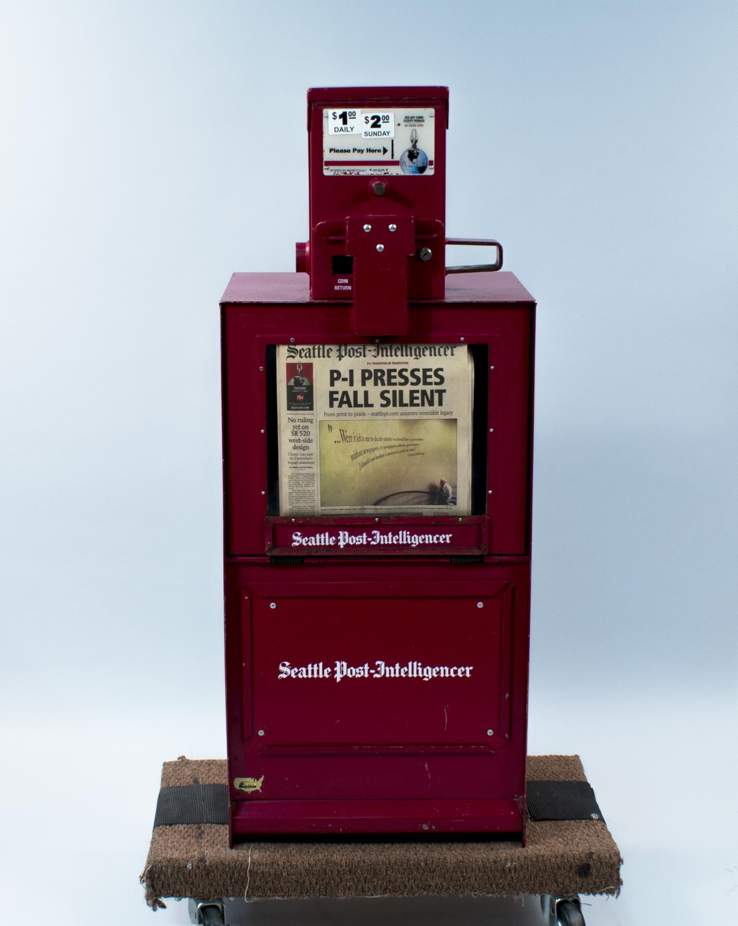 Image of Seattle Post-Intelligencer newspaper rack dispenser, ca. 1990s