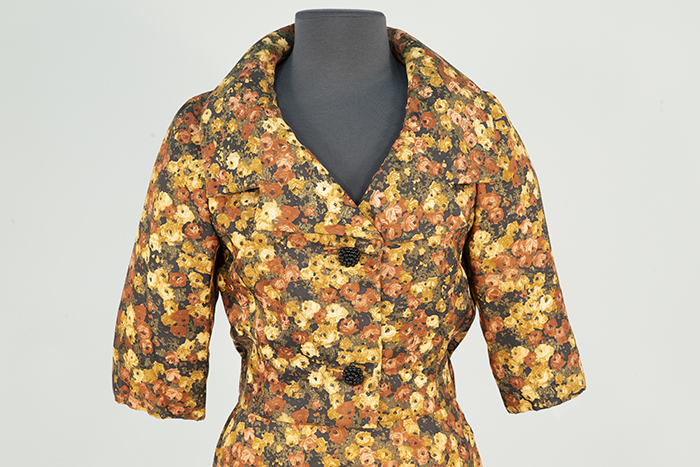 Image of Floral patterned skirt suit, worn by Louise McKinney, 1961