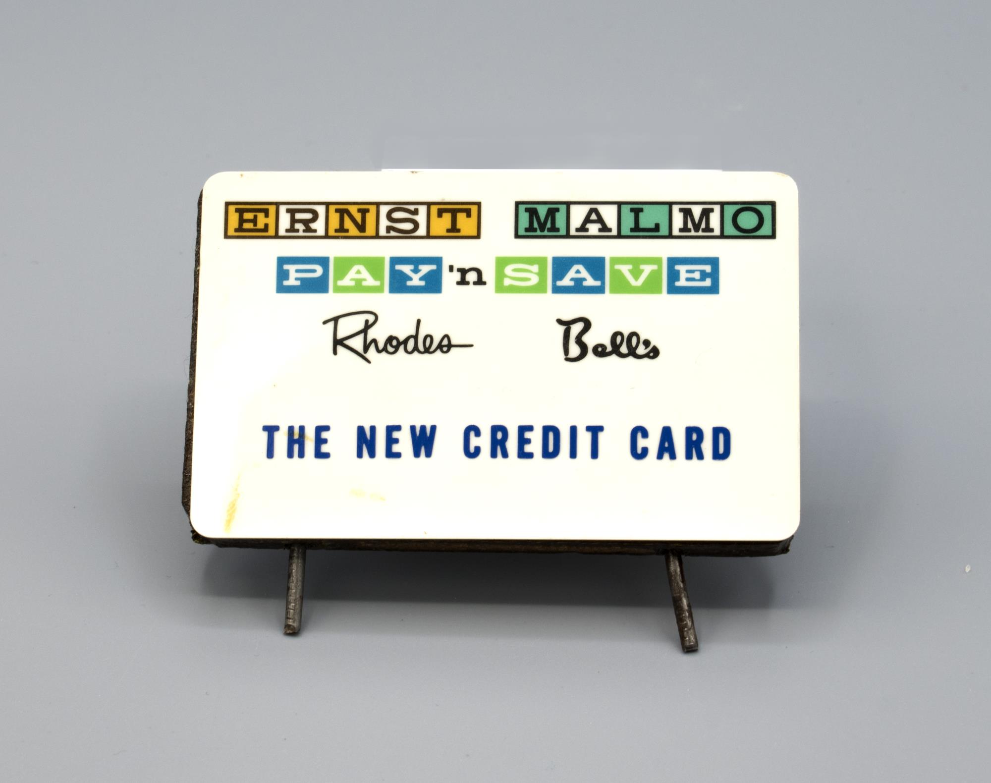Image of Cash register credit card sign plate from Pay 'n Save, ca. 1975
