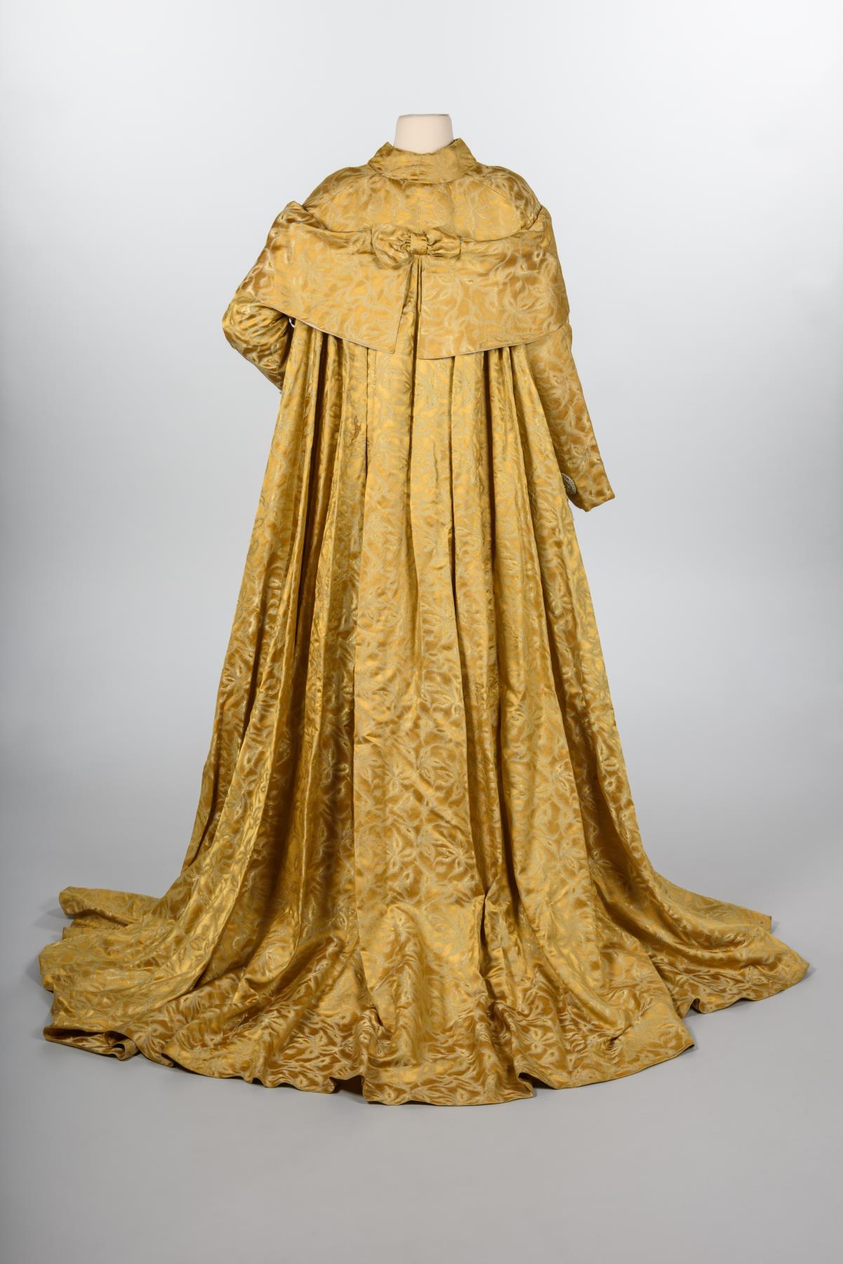 Image of Gold silk gown and coat designed by Howard Blair, 1959