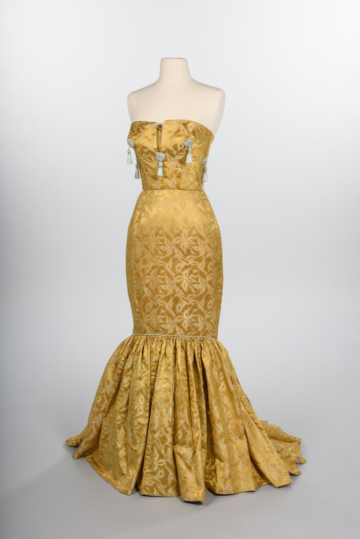 Image of Gold silk gown and coat designed by Howard Blair, 1959