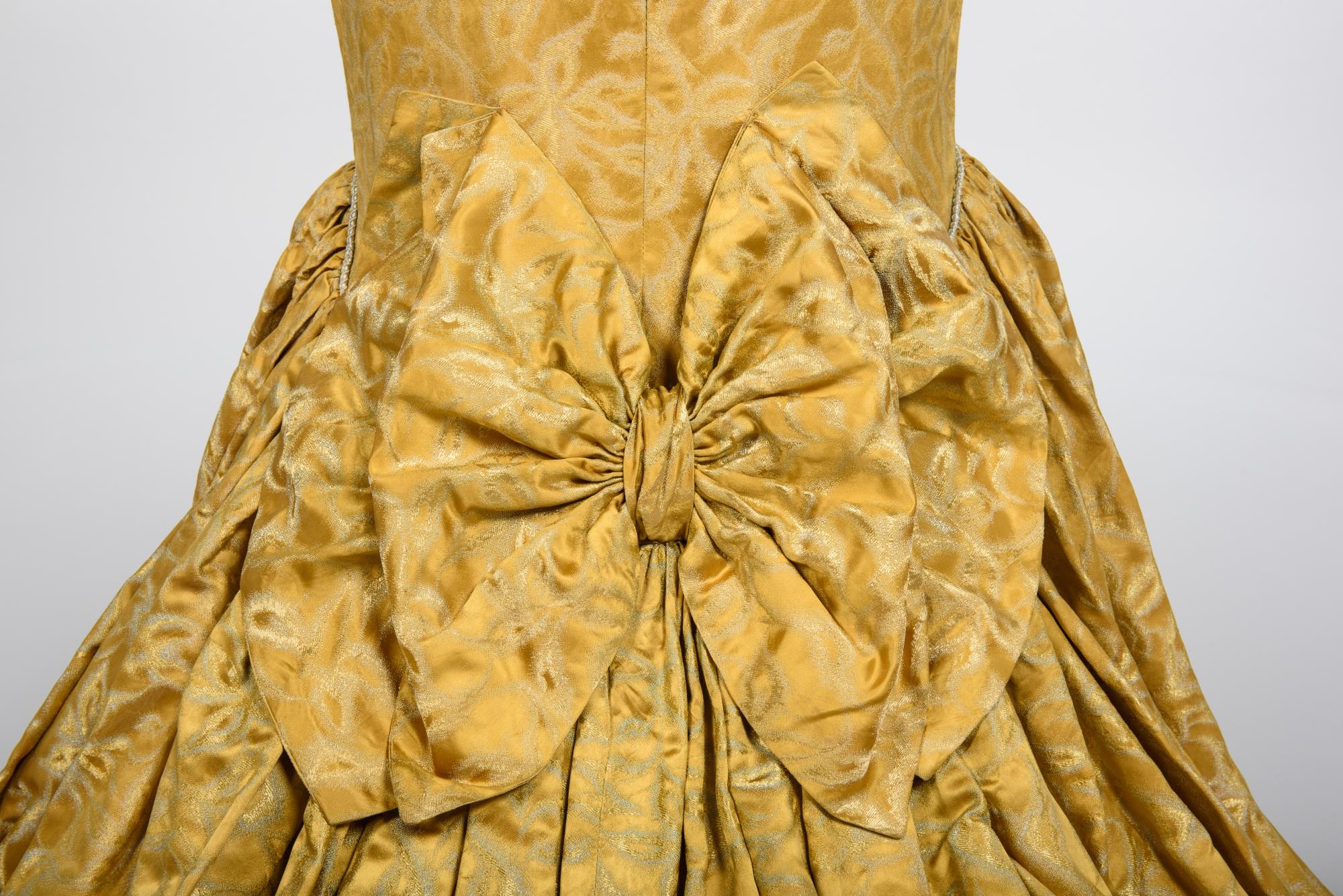 Image of Gold silk gown and coat designed by Howard Blair, 1959